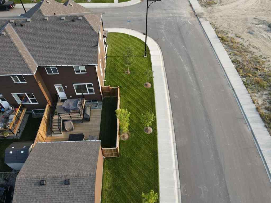 MLS® A2255196 - 63 Wolf Gate  in Wedderburn Okotoks, Residential