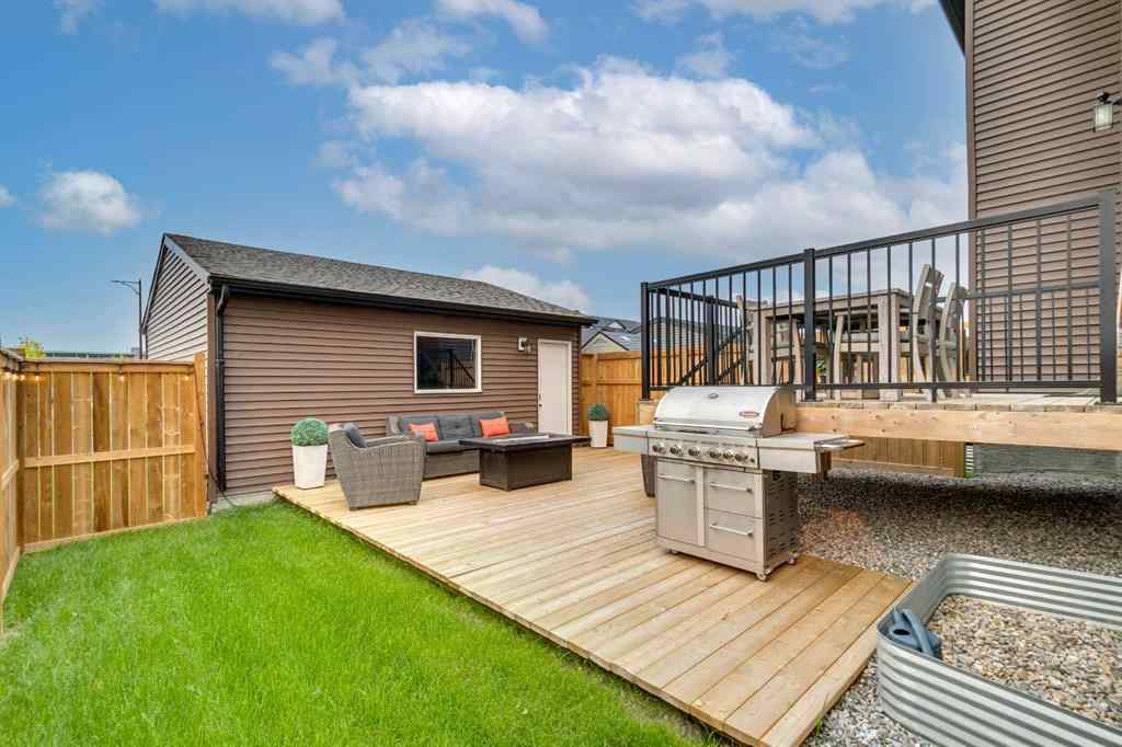 MLS® A2255196 - 63 Wolf Gate  in Wedderburn Okotoks, Residential