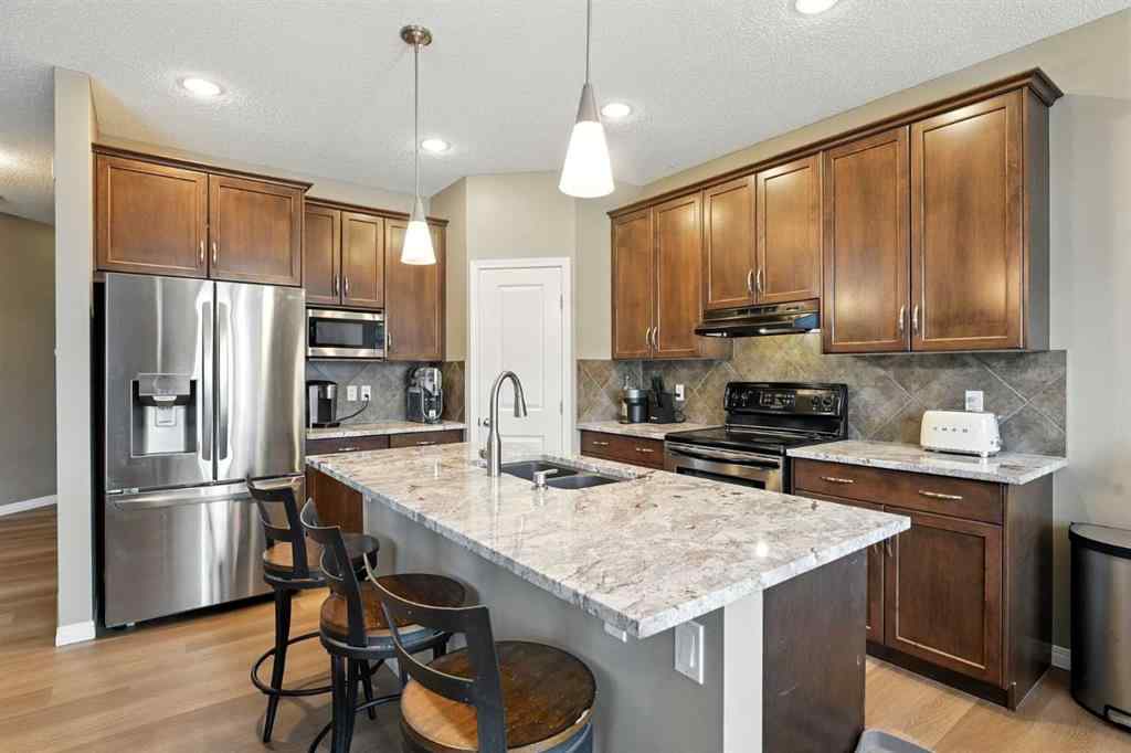 MLS® A2255211 - 247 Copperpond Circle SE in Copperfield Calgary, Residential