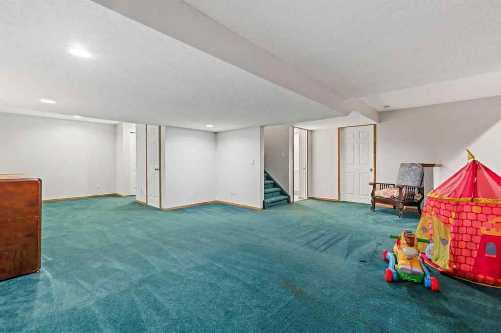 MLS® A2255216 - 109 Macewan Park View NW in MacEwan Glen Calgary, Residential