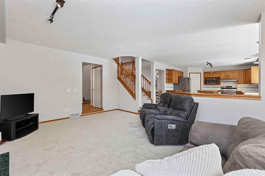 MLS® A2255216 - 109 Macewan Park View NW in MacEwan Glen Calgary, Residential