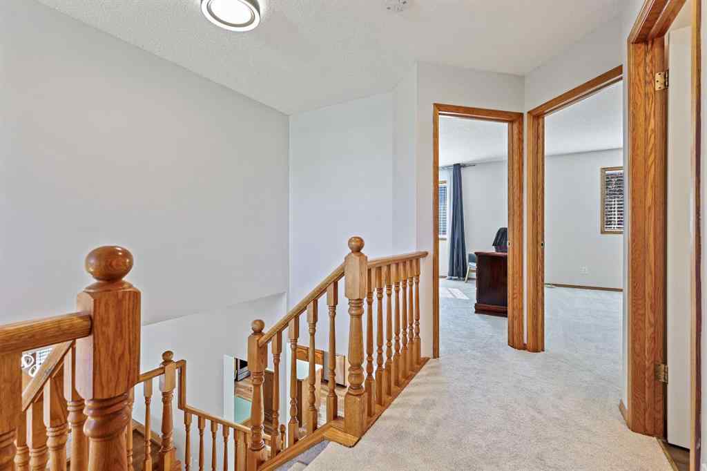 MLS® A2255216 - 109 Macewan Park View NW in MacEwan Glen Calgary, Residential