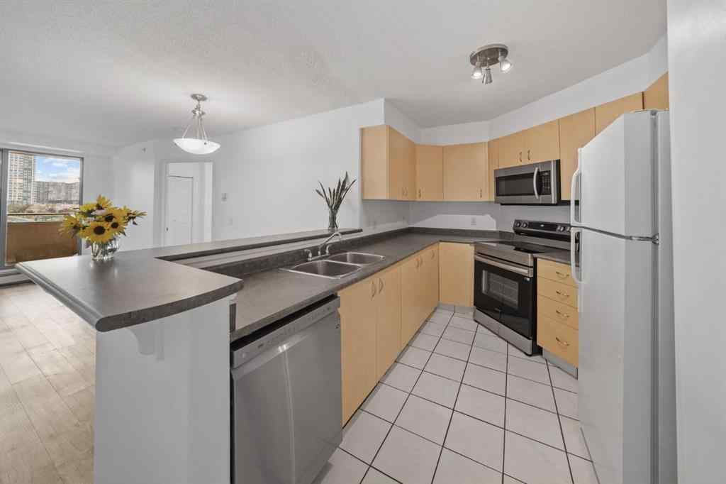 MLS® A2255218 - Unit #407 1121 6 Avenue SW in Downtown West End Calgary, Residential