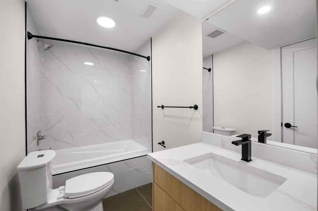 MLS® A2255231 - 1040 Lake Ontario Drive SE in Lake Bonavista Calgary, Residential