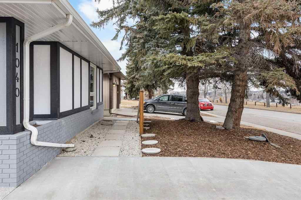 MLS® A2255231 - 1040 Lake Ontario Drive SE in Lake Bonavista Calgary, Residential
