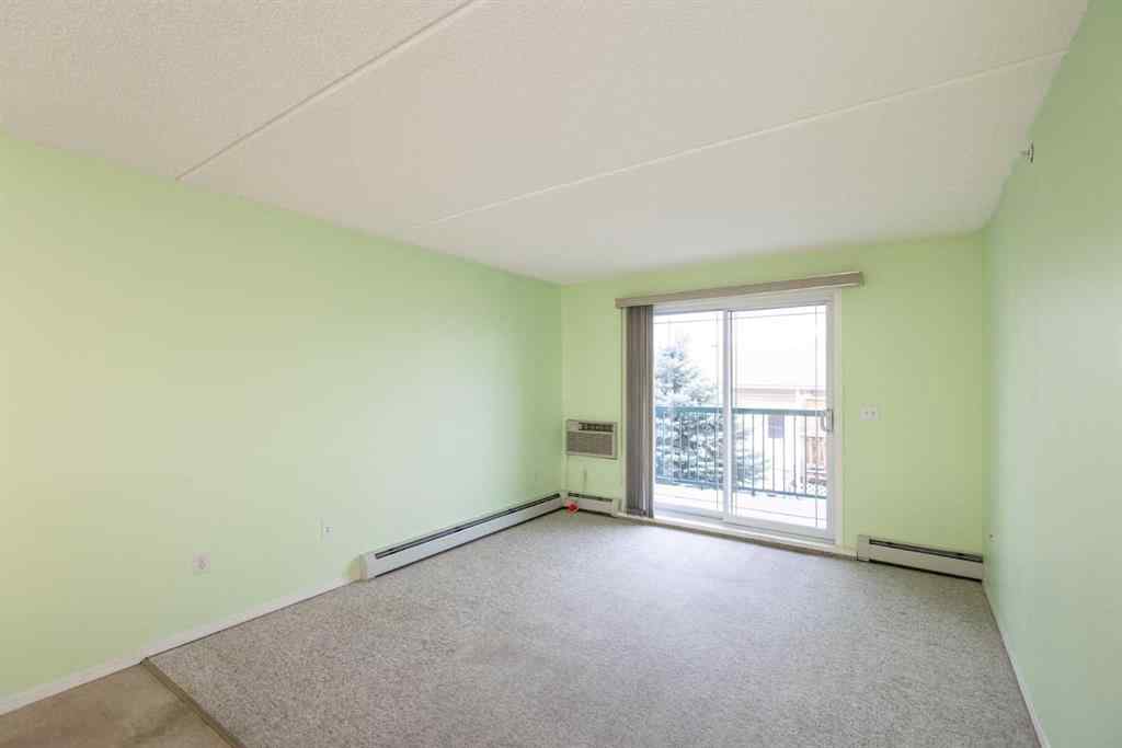 MLS® A2255239 - Unit #205 4319 49 Street  in Downtown Innisfail Innisfail, Residential