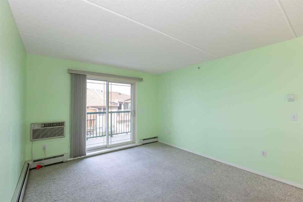 MLS® A2255239 - Unit #205 4319 49 Street  in Downtown Innisfail Innisfail, Residential