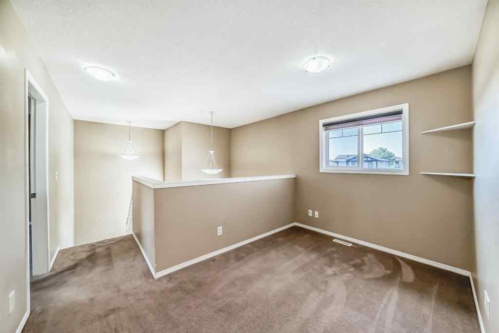 MLS® A2255240 - 2128 Luxstone Boulevard SW in Luxstone Airdrie, Residential
