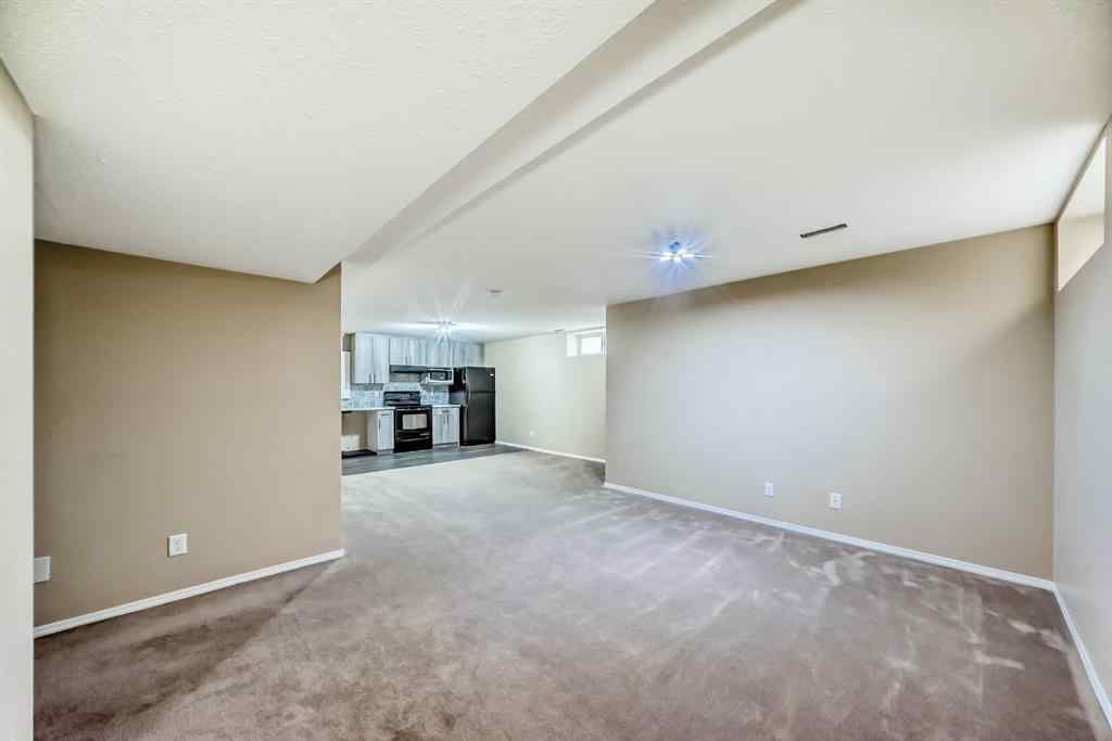 MLS® A2255240 - 2128 Luxstone Boulevard SW in Luxstone Airdrie, Residential