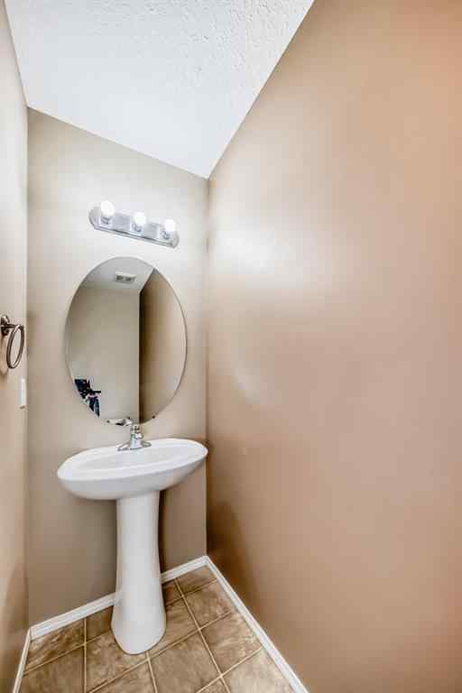 MLS® A2255240 - 2128 Luxstone Boulevard SW in Luxstone Airdrie, Residential
