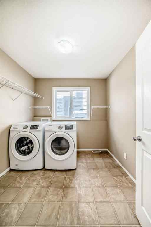 MLS® A2255240 - 2128 Luxstone Boulevard SW in Luxstone Airdrie, Residential