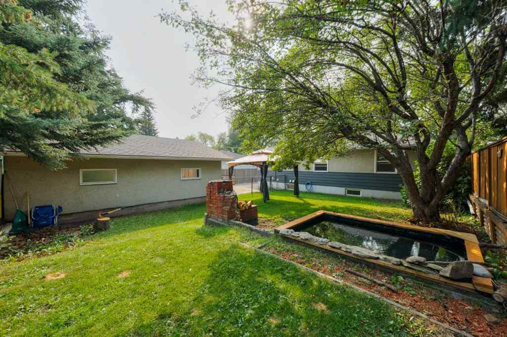 MLS® A2255261 - 412 Tavender Road NW in Thorncliffe Calgary, Residential
