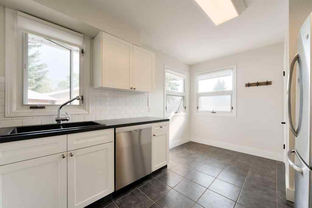 MLS® A2255261 - 412 Tavender Road NW in Thorncliffe Calgary, Residential