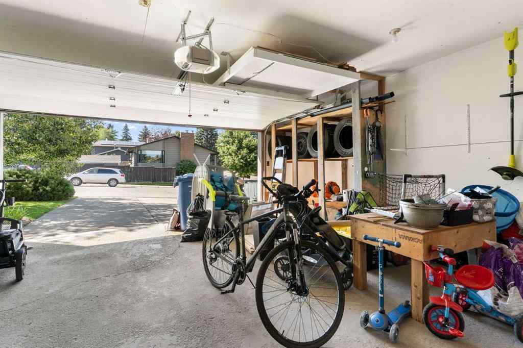 MLS® A2255271 - 9308 26 Street SW in Oakridge Calgary, Residential