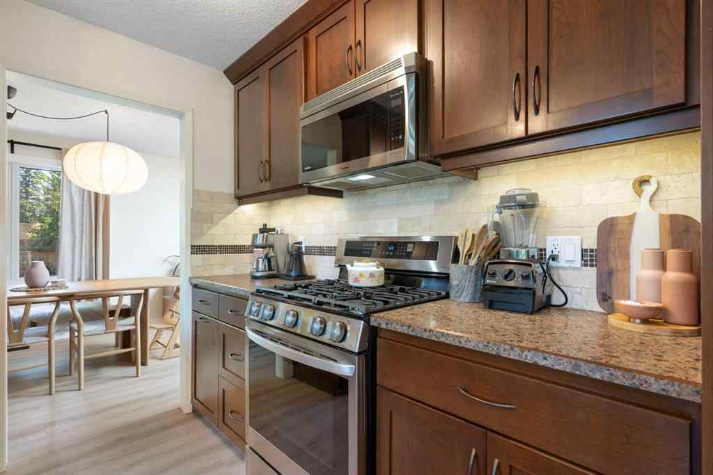 MLS® A2255271 - 9308 26 Street SW in Oakridge Calgary, Residential