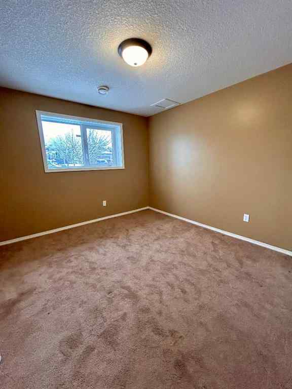 MLS&reg; # A2255286 - 122 Tartan Boulevard W in West Highlands Lethbridge, Residential Open Houses