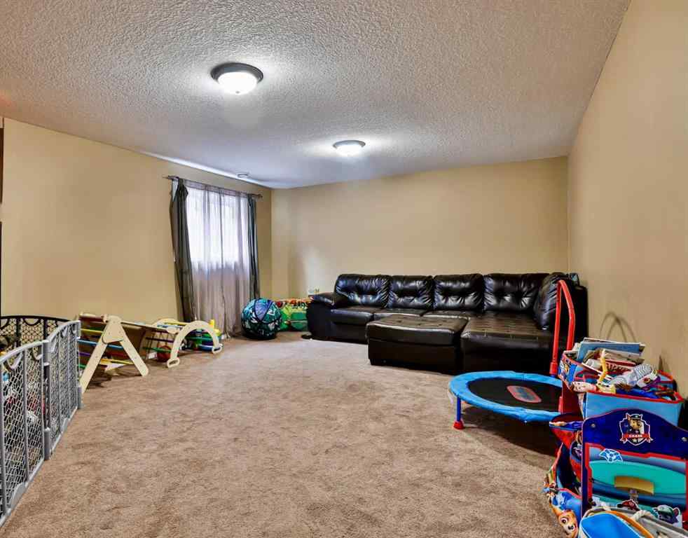 MLS® A2255286 - 122 Tartan Boulevard W in West Highlands Lethbridge, Residential