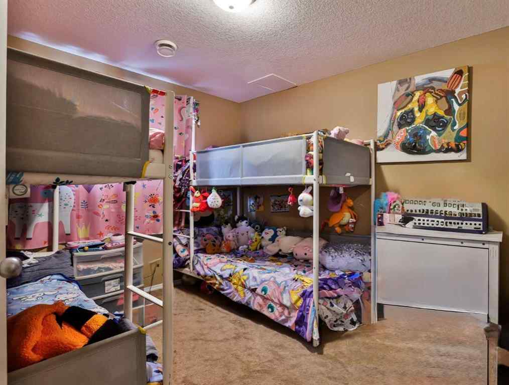 MLS® A2255286 - 122 Tartan Boulevard W in West Highlands Lethbridge, Residential