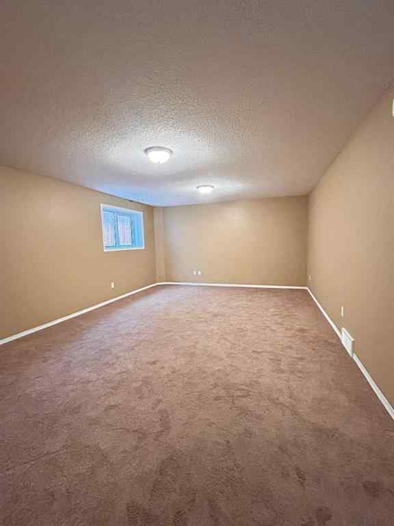 MLS&reg; # A2255286 - 122 Tartan Boulevard W in West Highlands Lethbridge, Residential Open Houses