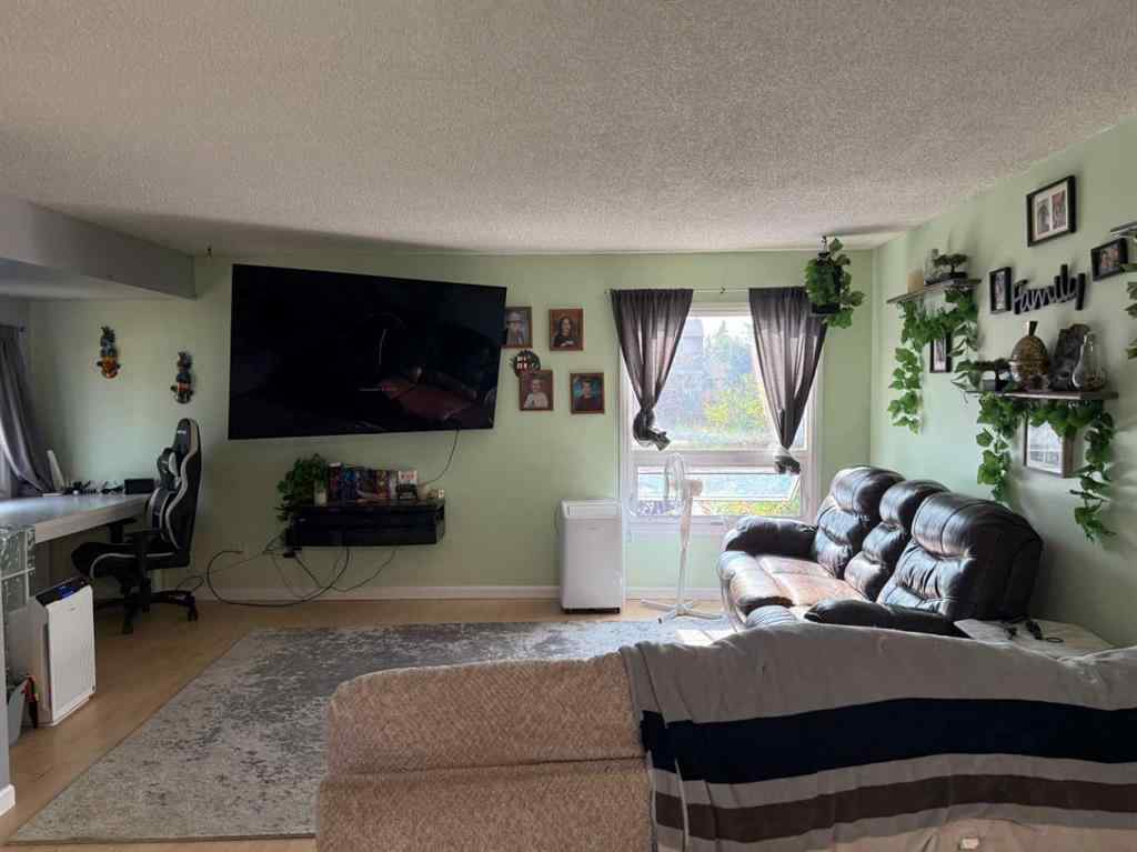 MLS® A2255303 - 9852 72 Avenue  in South Patterson Place Grande Prairie, Residential