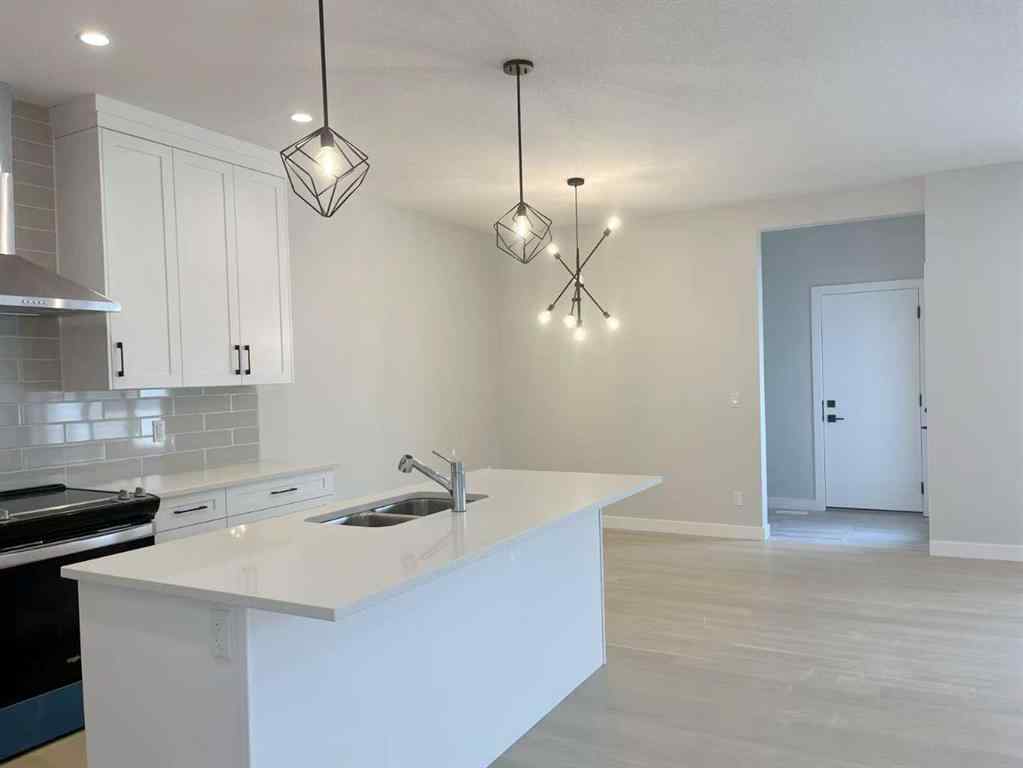MLS® A2255338 - 101 Treeline Manor SW in Alpine Park Calgary, Residential