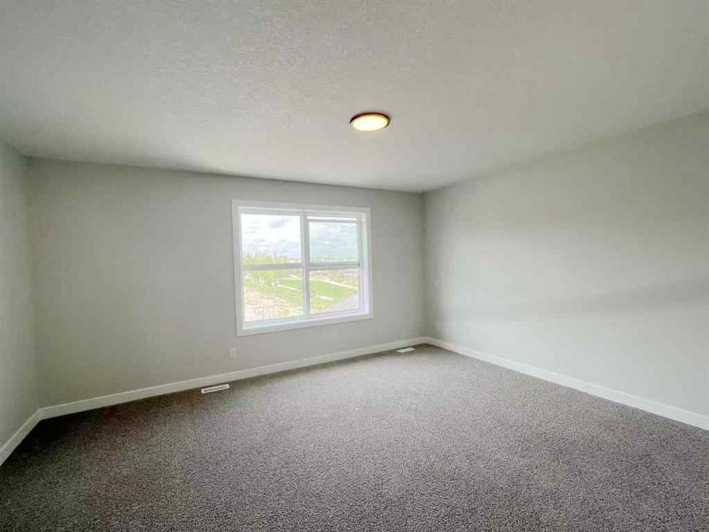 MLS® A2255338 - 101 Treeline Manor SW in Alpine Park Calgary, Residential