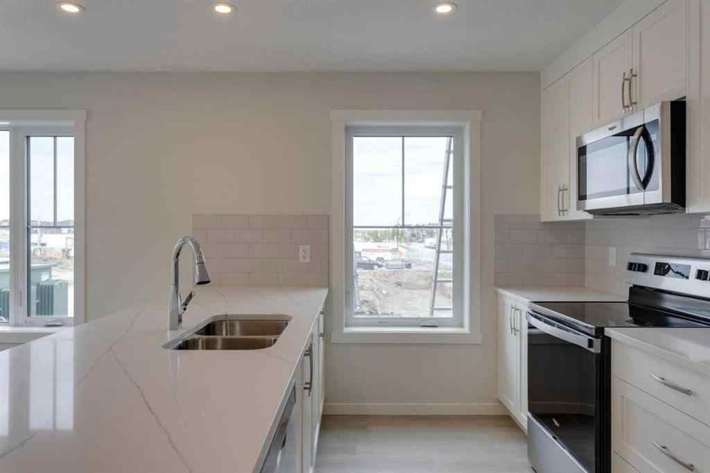 MLS® A2255341 - Unit #215 40 Livingston Parade NE in Livingston Calgary, Residential