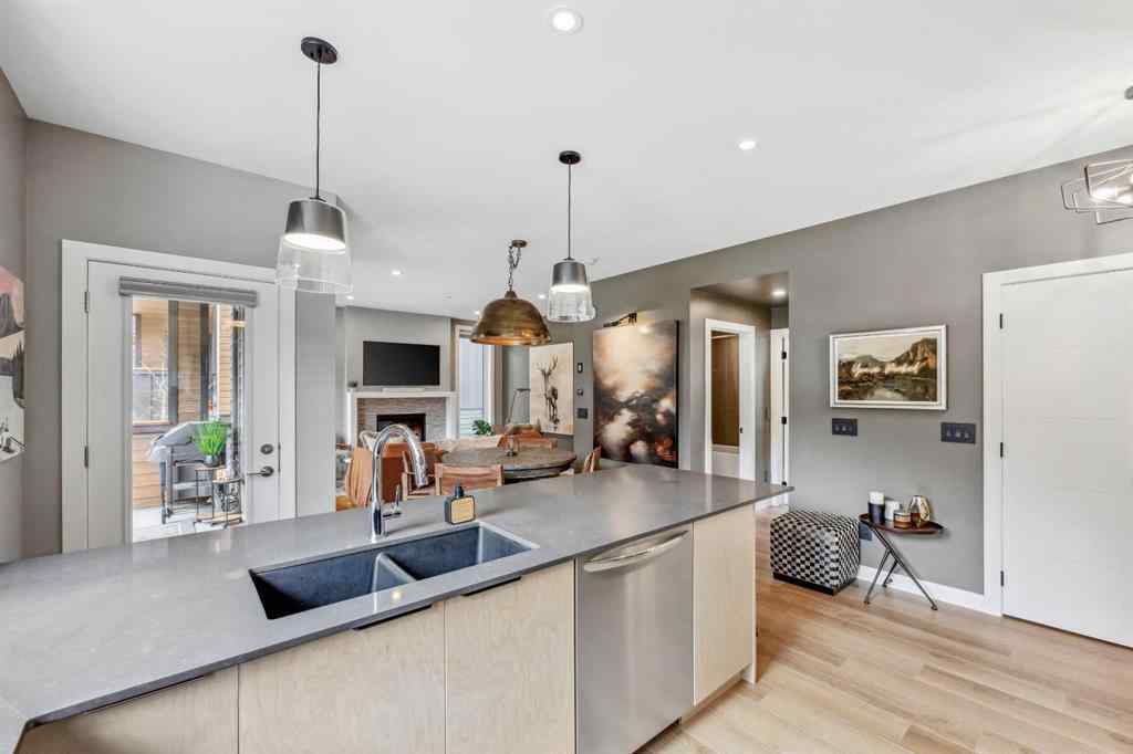 MLS® A2255379 - Unit #201H 209 Stewart Creek Rise  in Three Sisters Canmore, Residential