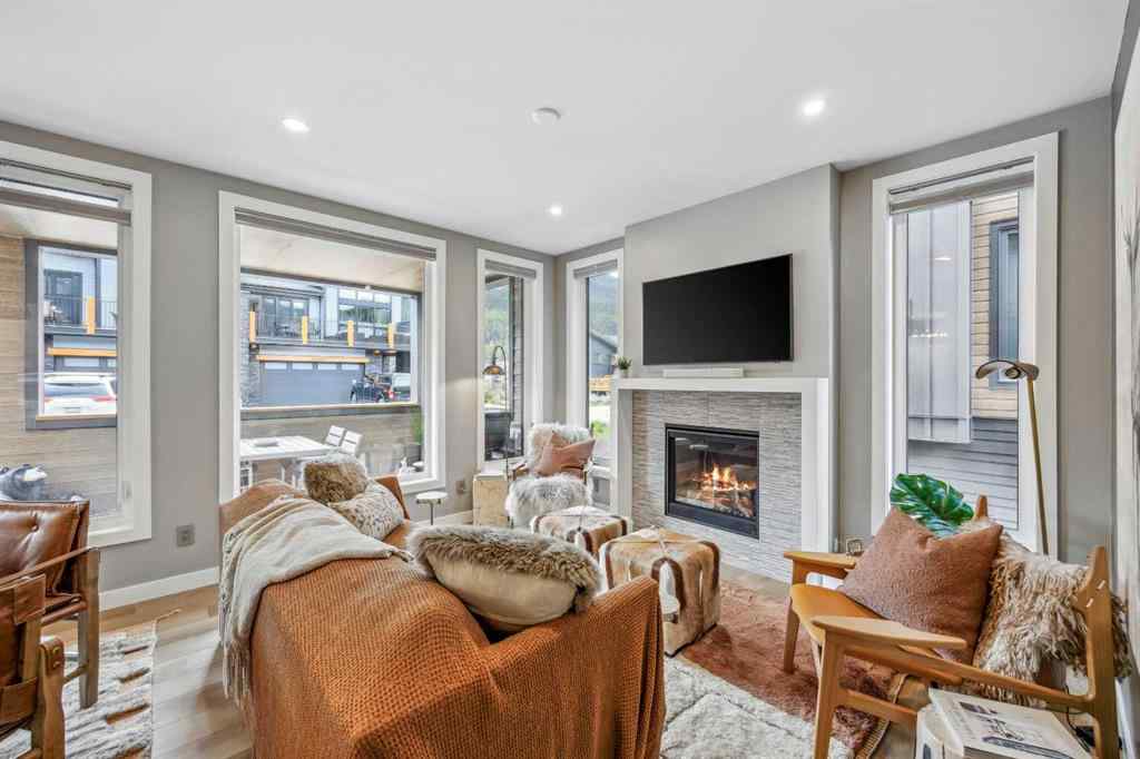 MLS® A2255379 - Unit #201H 209 Stewart Creek Rise  in Three Sisters Canmore, Residential