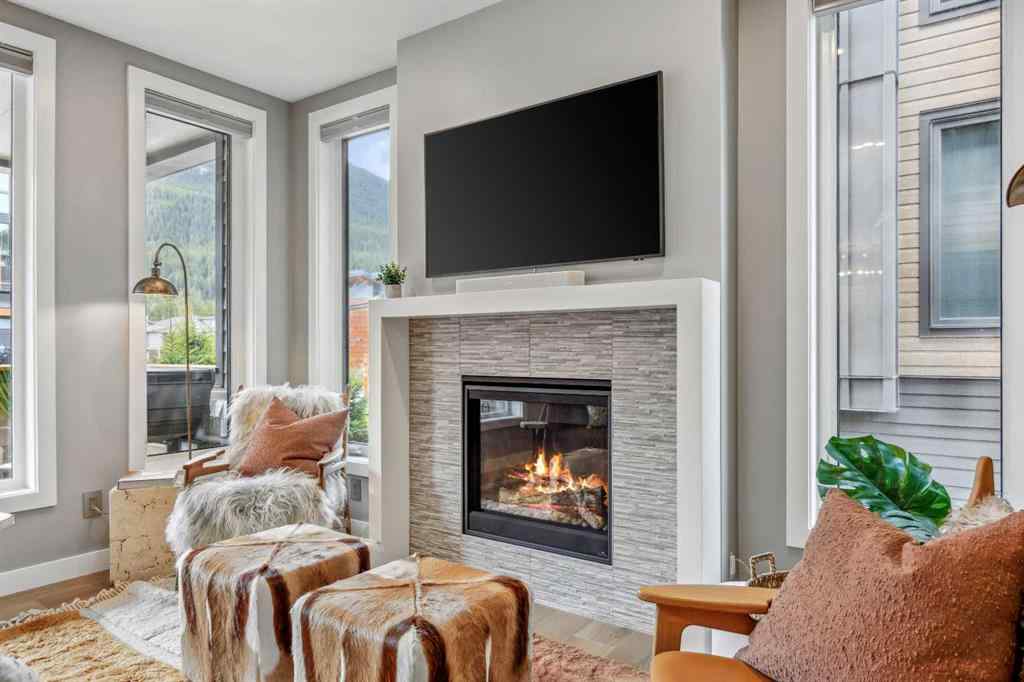 MLS® A2255379 - Unit #201H 209 Stewart Creek Rise  in Three Sisters Canmore, Residential