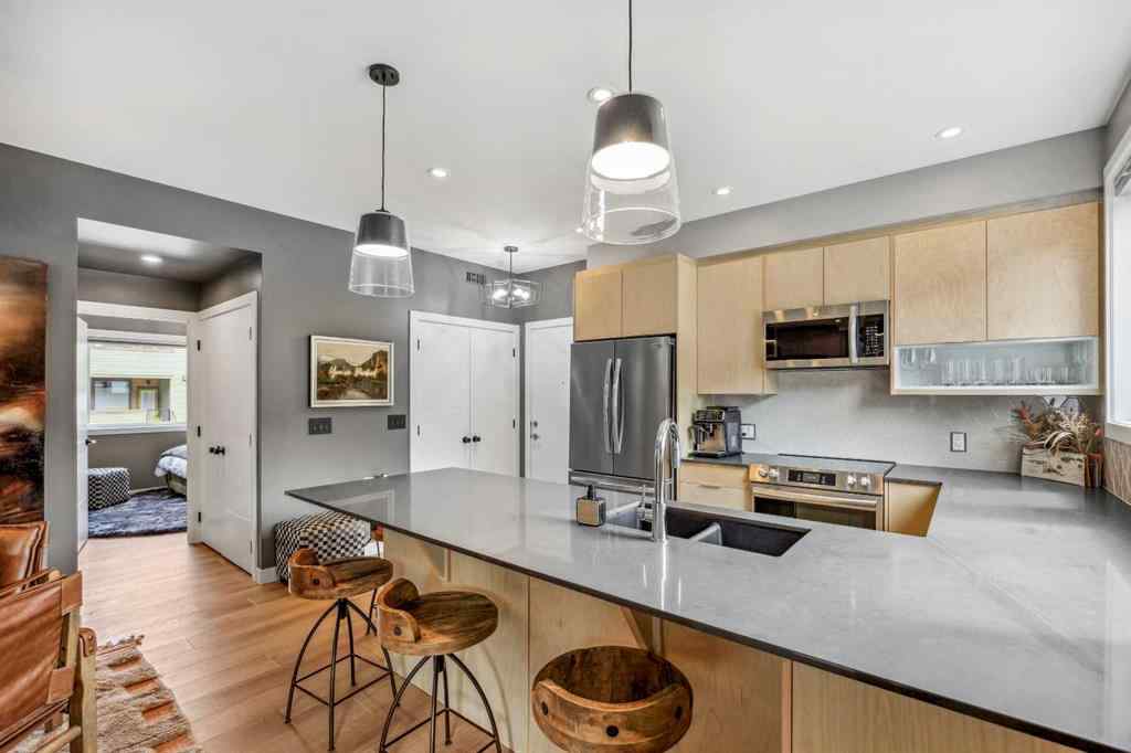 MLS® A2255379 - Unit #201H 209 Stewart Creek Rise  in Three Sisters Canmore, Residential