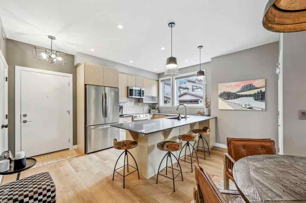 MLS® A2255379 - Unit #201H 209 Stewart Creek Rise  in Three Sisters Canmore, Residential
