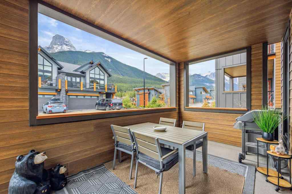 MLS® A2255379 - Unit #201H 209 Stewart Creek Rise  in Three Sisters Canmore, Residential
