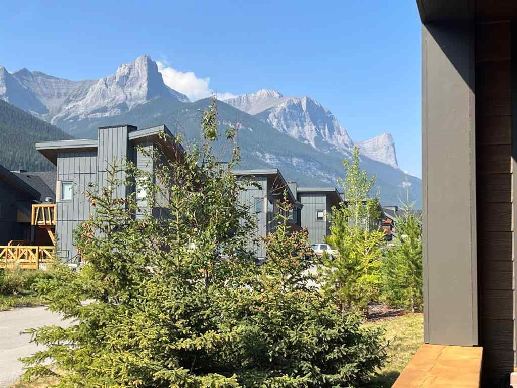MLS® A2255379 - Unit #201H 209 Stewart Creek Rise  in Three Sisters Canmore, Residential