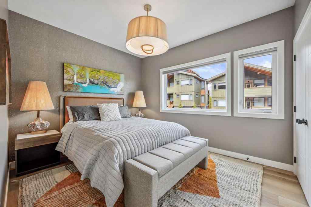 MLS® A2255379 - Unit #201H 209 Stewart Creek Rise  in Three Sisters Canmore, Residential