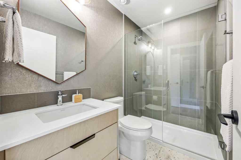 MLS® A2255379 - Unit #201H 209 Stewart Creek Rise  in Three Sisters Canmore, Residential