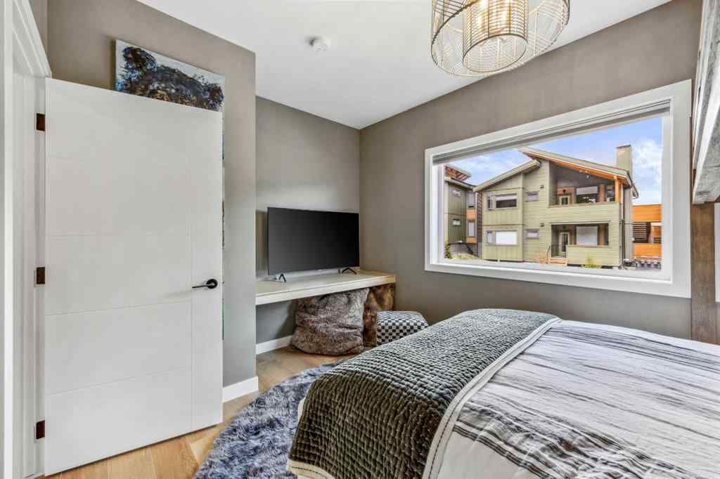 MLS® A2255379 - Unit #201H 209 Stewart Creek Rise  in Three Sisters Canmore, Residential