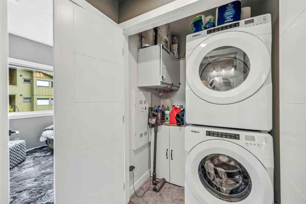 MLS® A2255379 - Unit #201H 209 Stewart Creek Rise  in Three Sisters Canmore, Residential