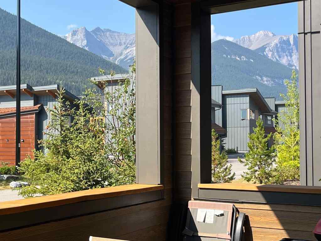 MLS® A2255379 - Unit #201H 209 Stewart Creek Rise  in Three Sisters Canmore, Residential