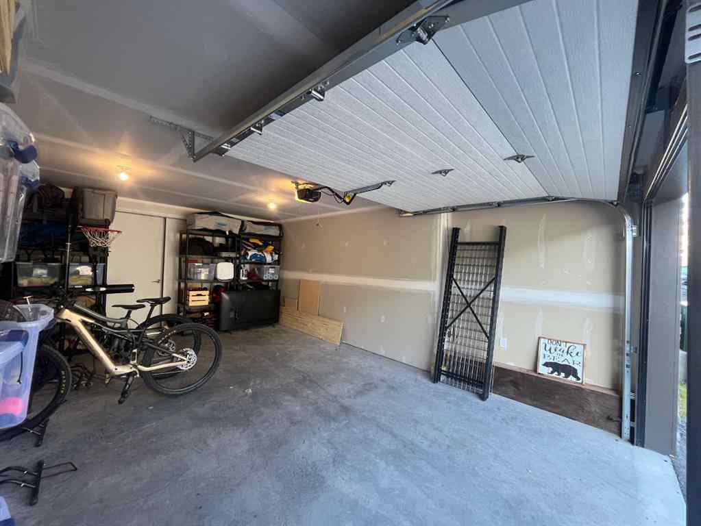 MLS® A2255379 - Unit #201H 209 Stewart Creek Rise  in Three Sisters Canmore, Residential