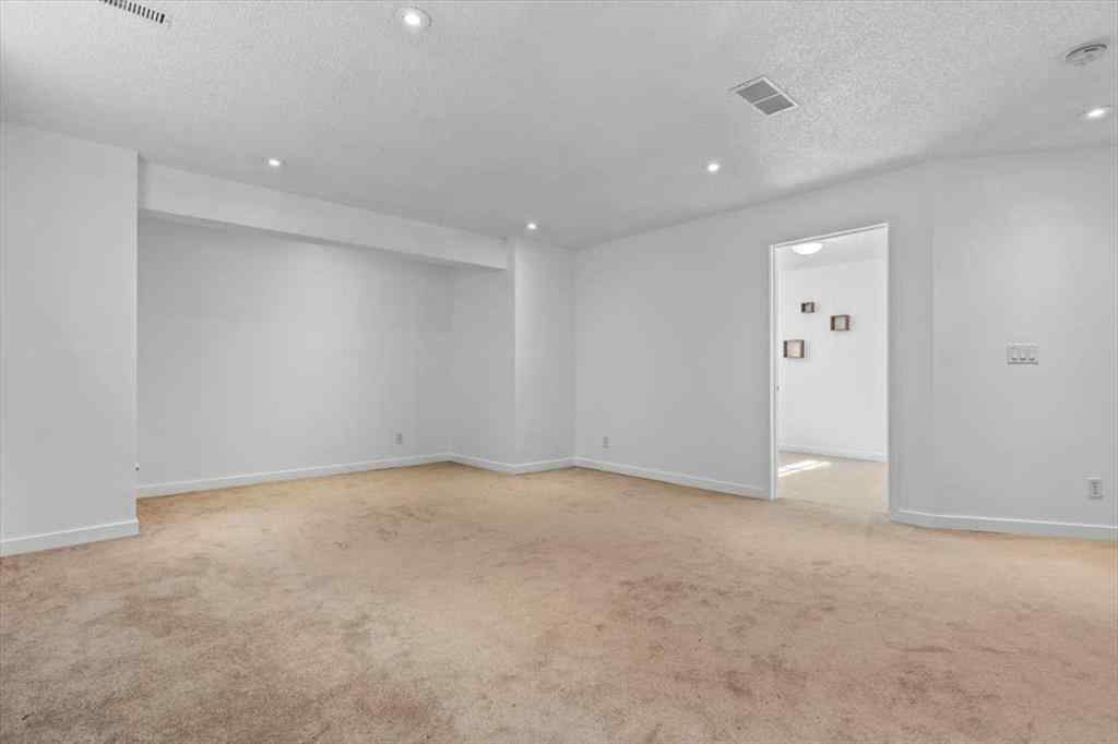 MLS® A2255389 - 57 Everwillow Boulevard SW in Evergreen Calgary, Residential