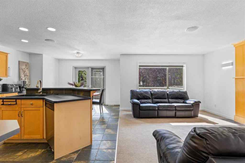 MLS® A2255389 - 57 Everwillow Boulevard SW in Evergreen Calgary, Residential
