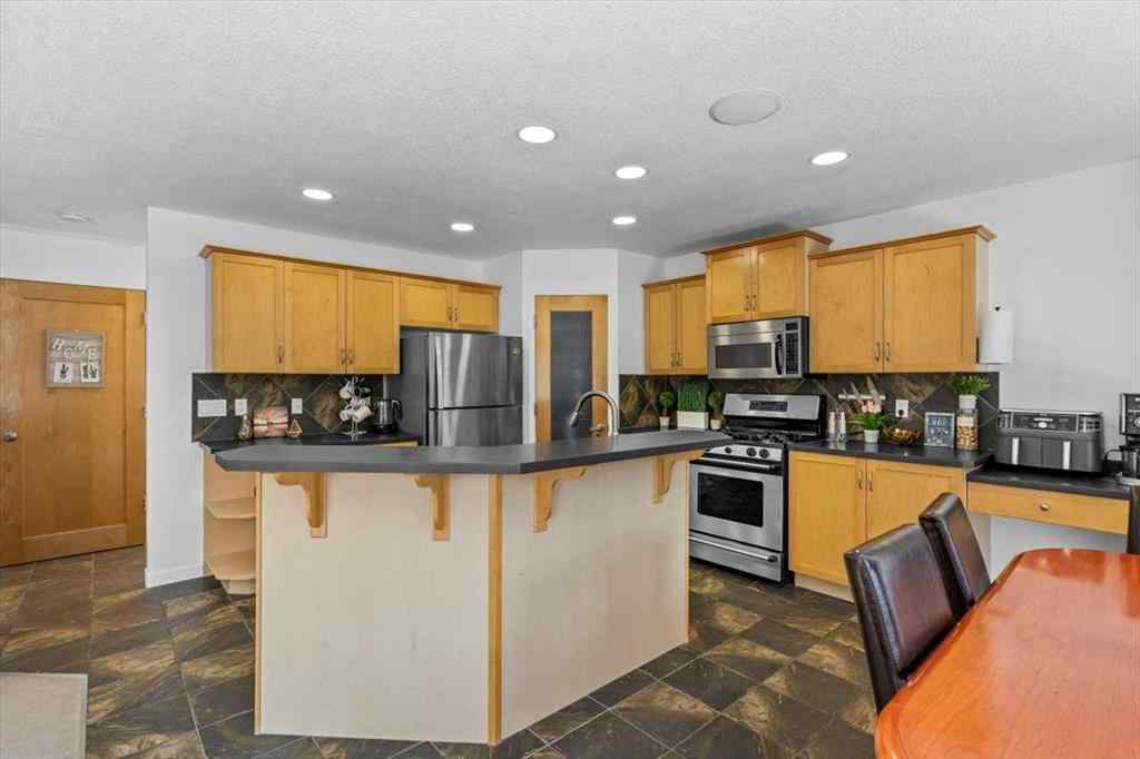 MLS® A2255389 - 57 Everwillow Boulevard SW in Evergreen Calgary, Residential