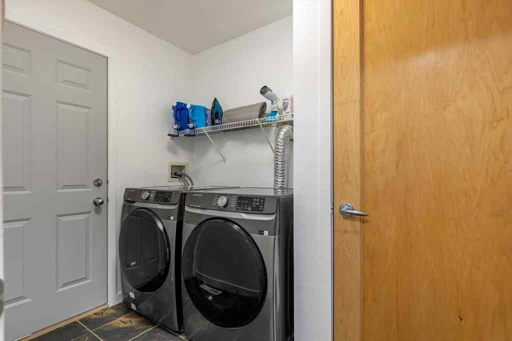 MLS® A2255389 - 57 Everwillow Boulevard SW in Evergreen Calgary, Residential