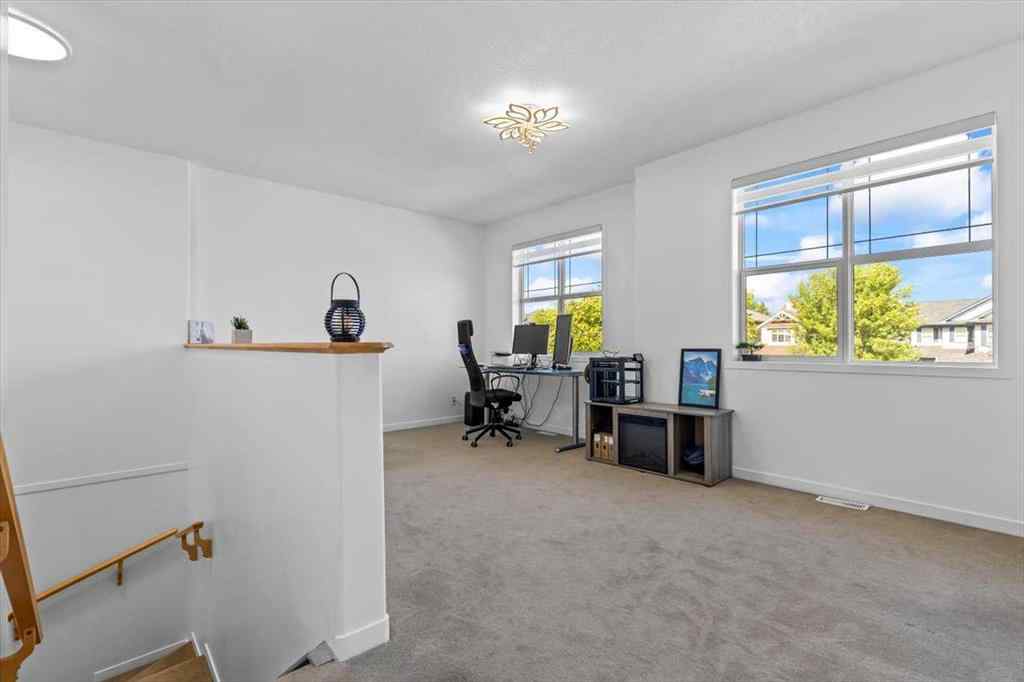 MLS® A2255389 - 57 Everwillow Boulevard SW in Evergreen Calgary, Residential