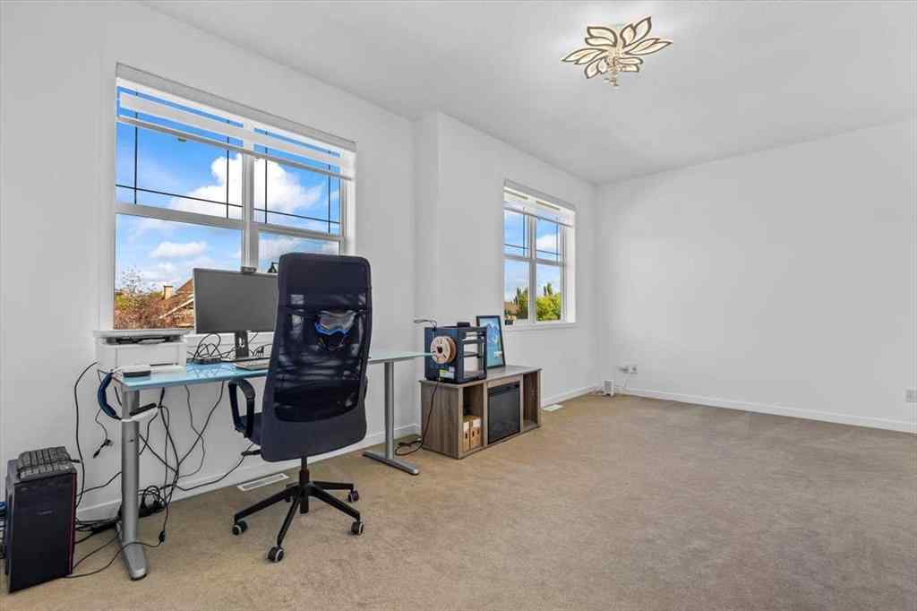 MLS® A2255389 - 57 Everwillow Boulevard SW in Evergreen Calgary, Residential