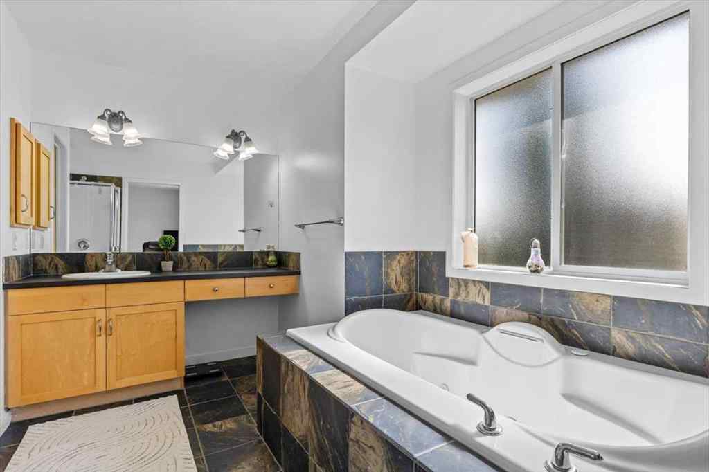 MLS® A2255389 - 57 Everwillow Boulevard SW in Evergreen Calgary, Residential