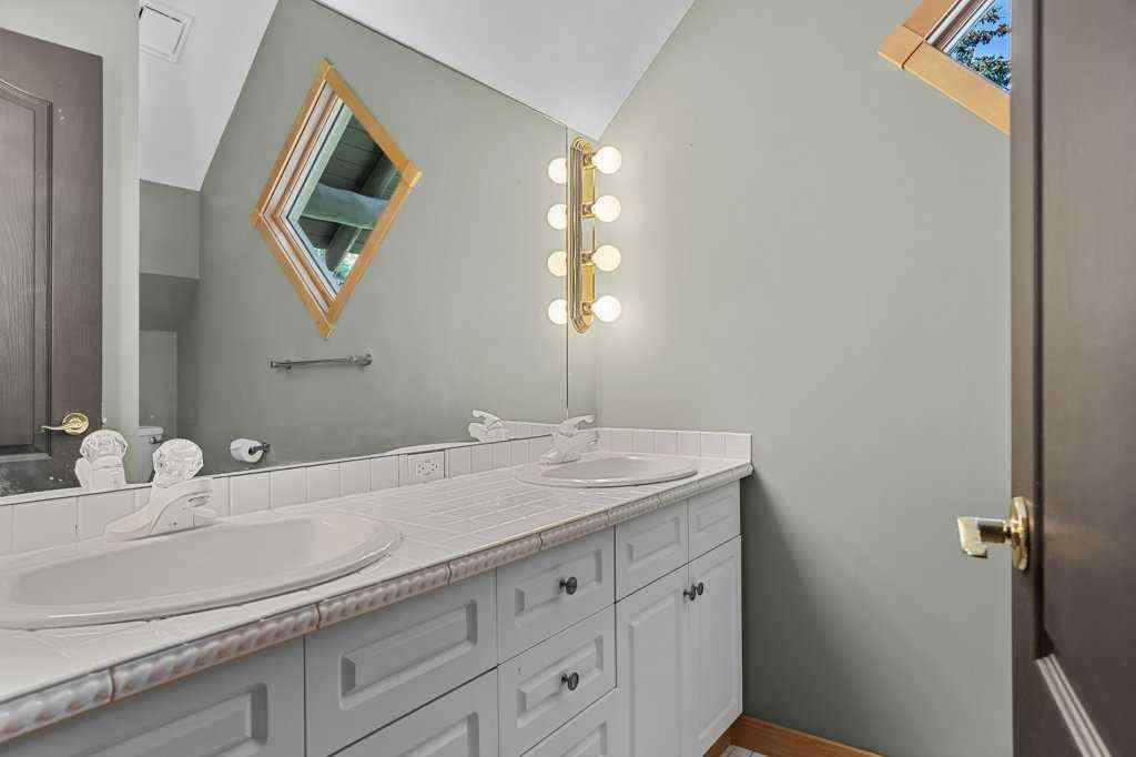MLS® A2255390 - 18 Canyon Road  in Canyon Ridge Canmore, Residential