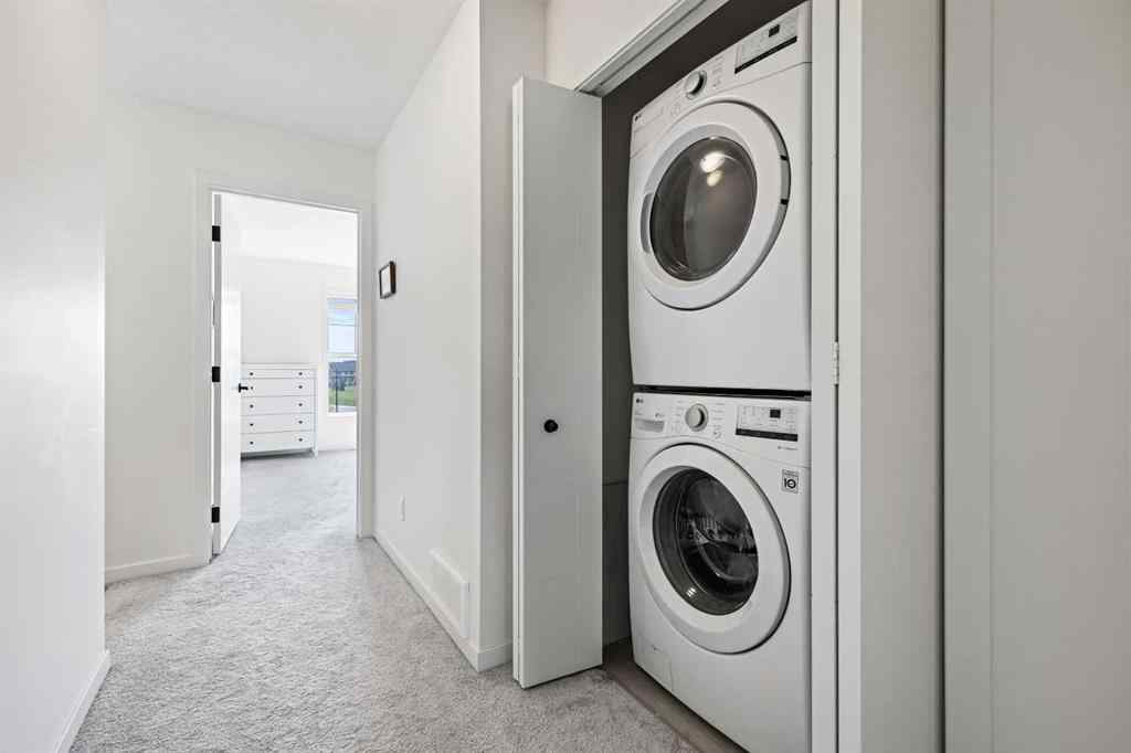 MLS® A2255419 - 415 South Point Lane SW in South Point Airdrie, Residential