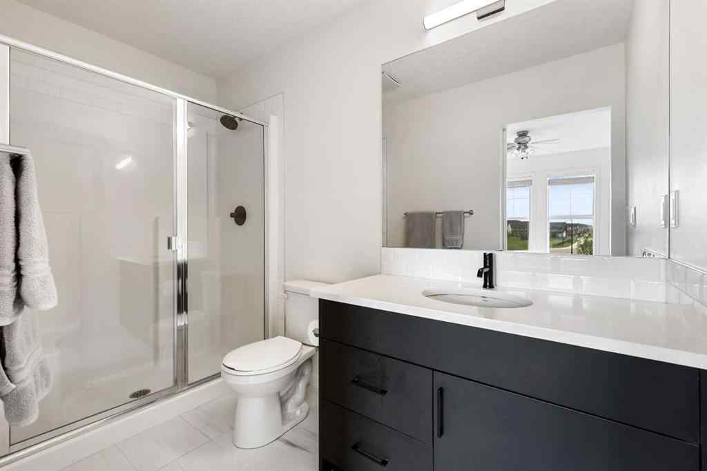 MLS® A2255419 - 415 South Point Lane SW in South Point Airdrie, Residential